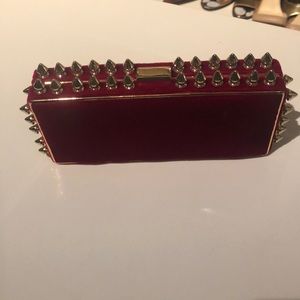 Red velvet clutch w gold spikes